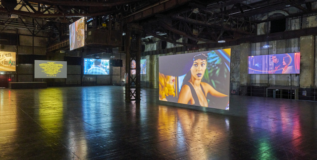 A big screen showing a music video during World of Music Video, Völklingen Ironworks UNESCO World Heritage Site