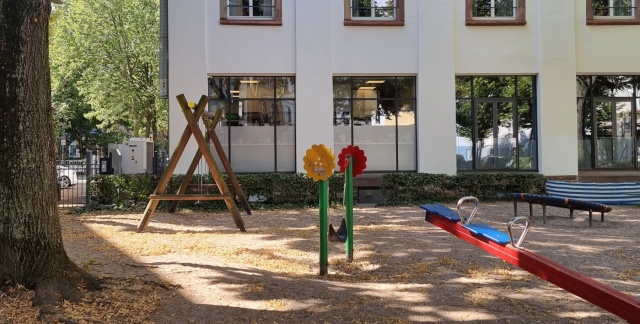 Swings and see saw children's playground Nauwieserplatz